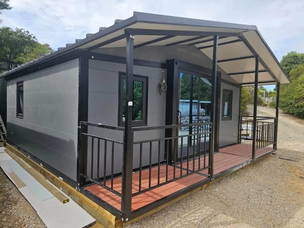 20 ft container home Chch with insulated panels and front deck under installation