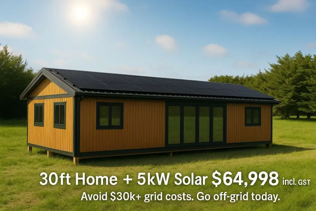 30ft off grid home in New Zealand with flush black solar panels on roof, portable dwelling designed for sustainable rural living