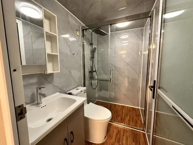 Modern bathroom interior designed for container homes NZ and transportable homes, featuring stylish fittings and elegant finish