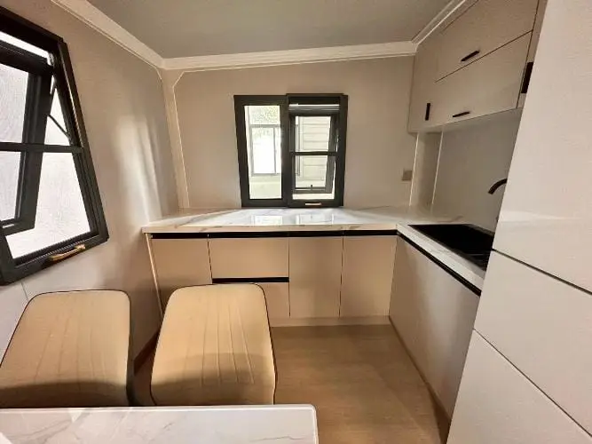 Elegant kitchen interior of transportable homes and container homes NZ, designed for compact living spaces.