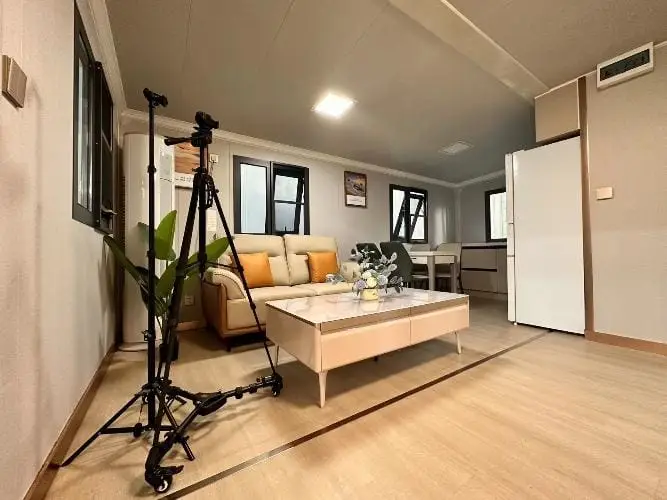 Stylish living area in transportable homes and prefabricated homes NZ, featuring modern decor and open layout